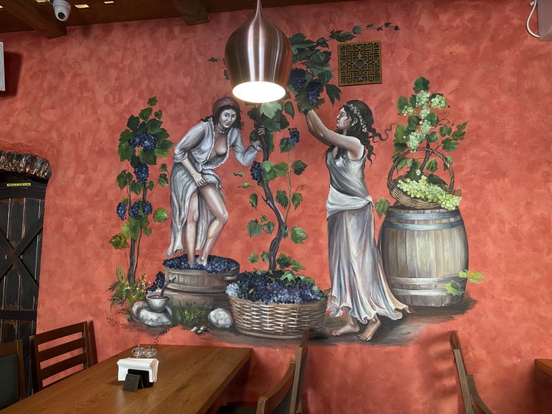 Classical Wine Harvest Scene Brings Warmth to Interior