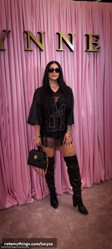 High-Impact Black Look with Strong Luxe Accessories